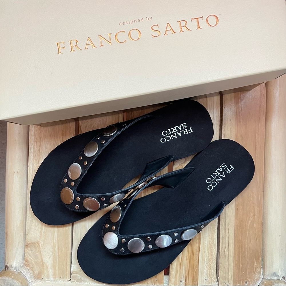 Franco Sarto flip flops with metal details